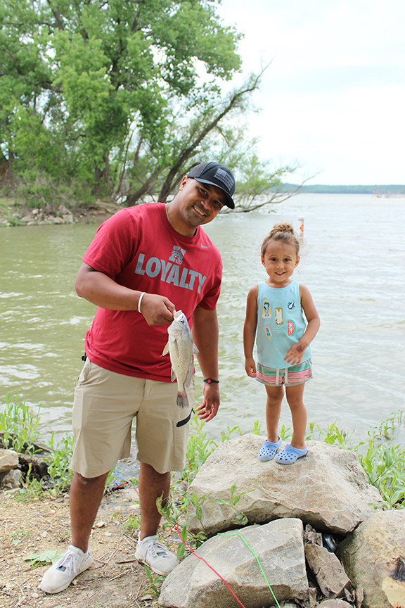 Dad and daughter fishing