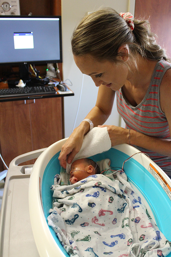 NICU baby in the bathtub